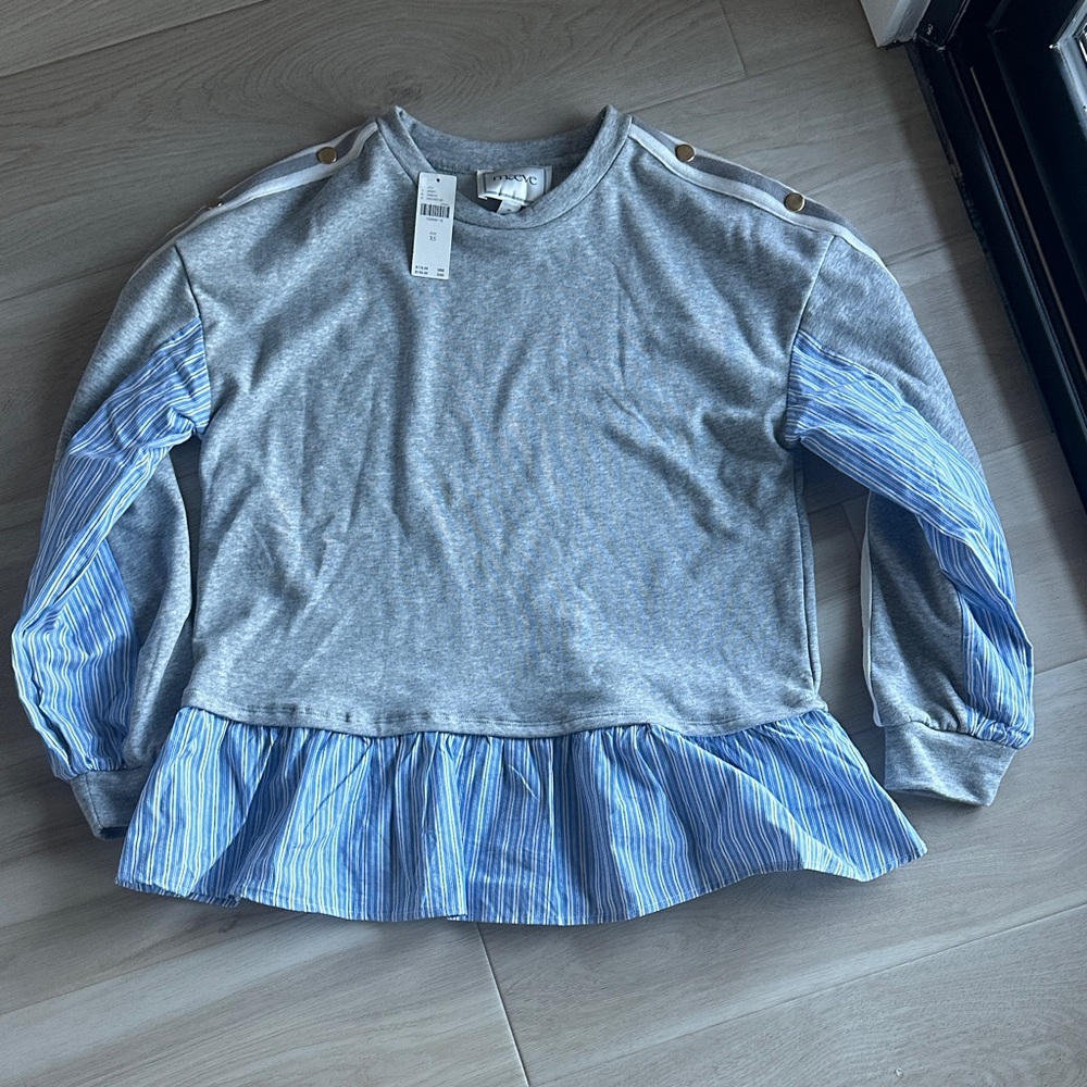 Maeve Gray Top with Blue Striped Sleeves and Ruffle Hem